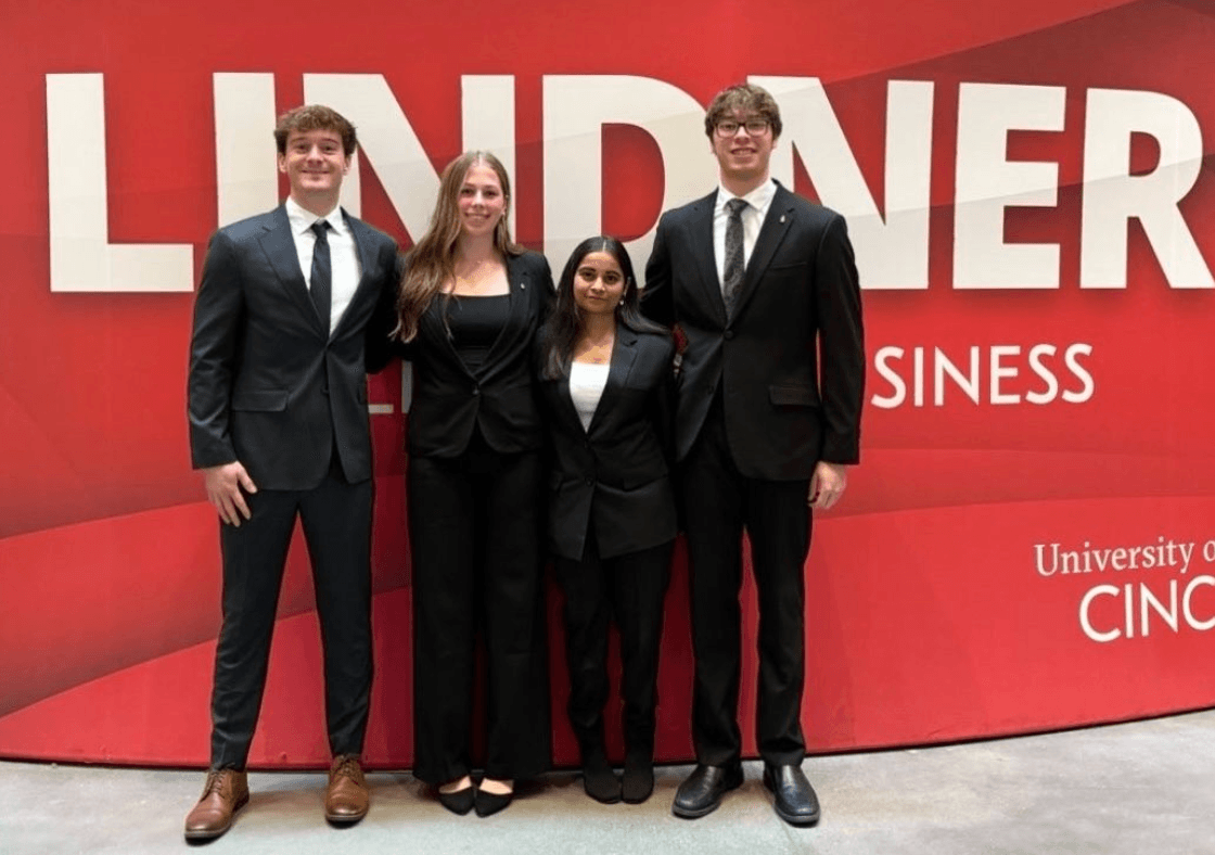 Jacob Gillotti and fellow UC students at Lindner College of Business event